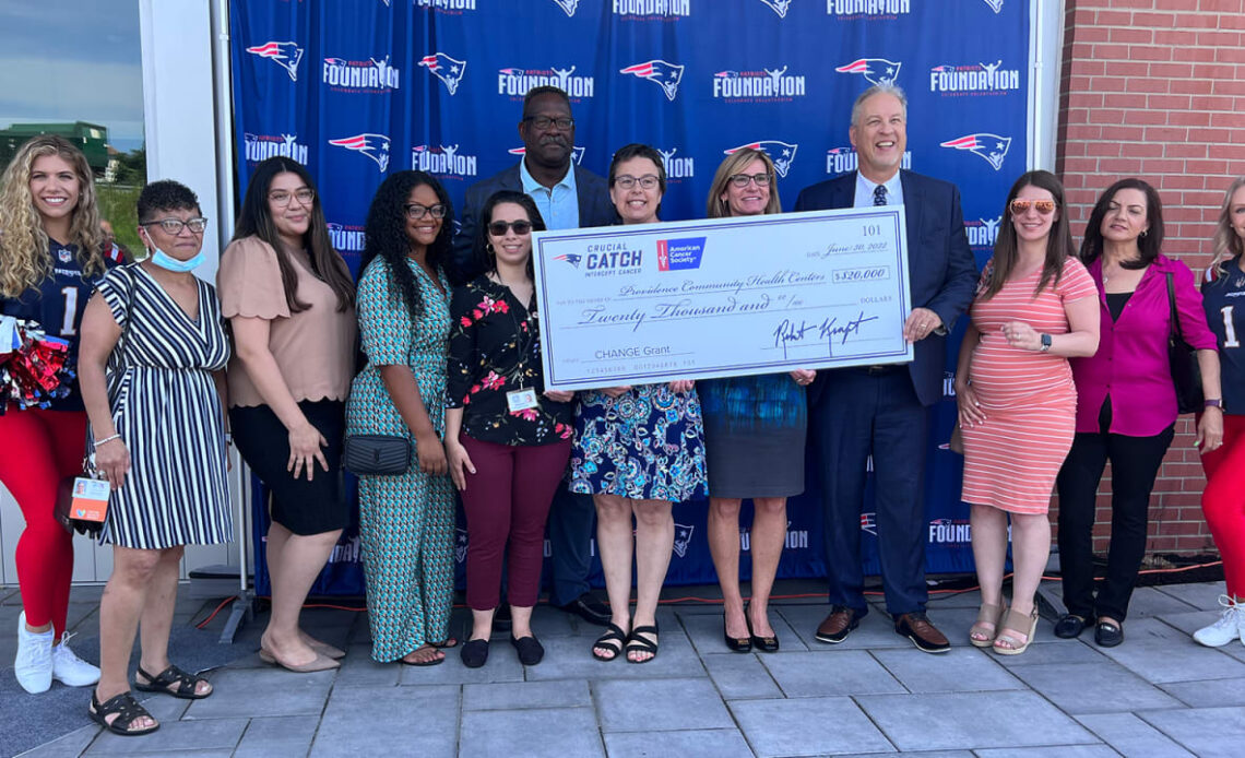 Patriots present Providence Community Health Centers with $20K grant to benefit breast cancer screenings