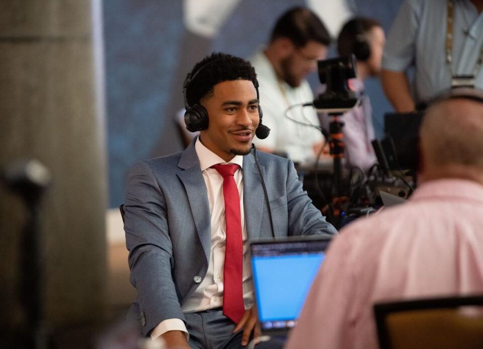 Alabama quarterback Bryce Young is interviewed on radio row during SEC Media Days at the College Football Hall of Fame in Atlanta Tuesday, July 19, 2022.