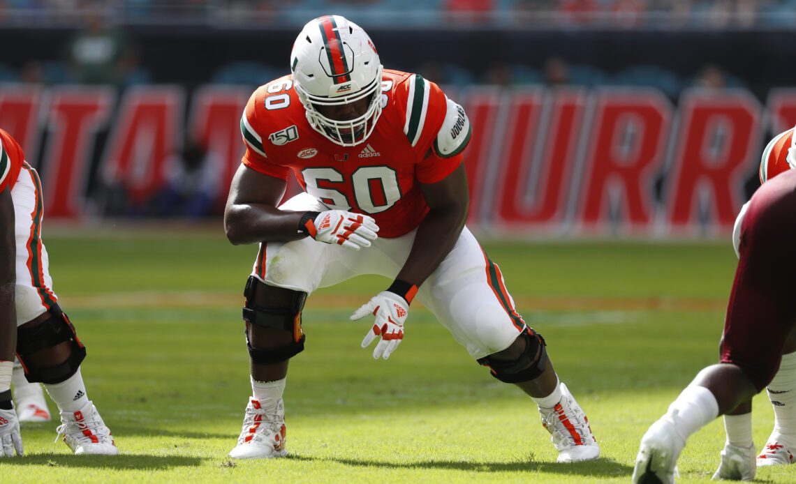 Chiefs select OT Zion Nelson, TE Cameron Latu