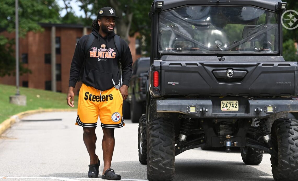 Players arrive at training camp