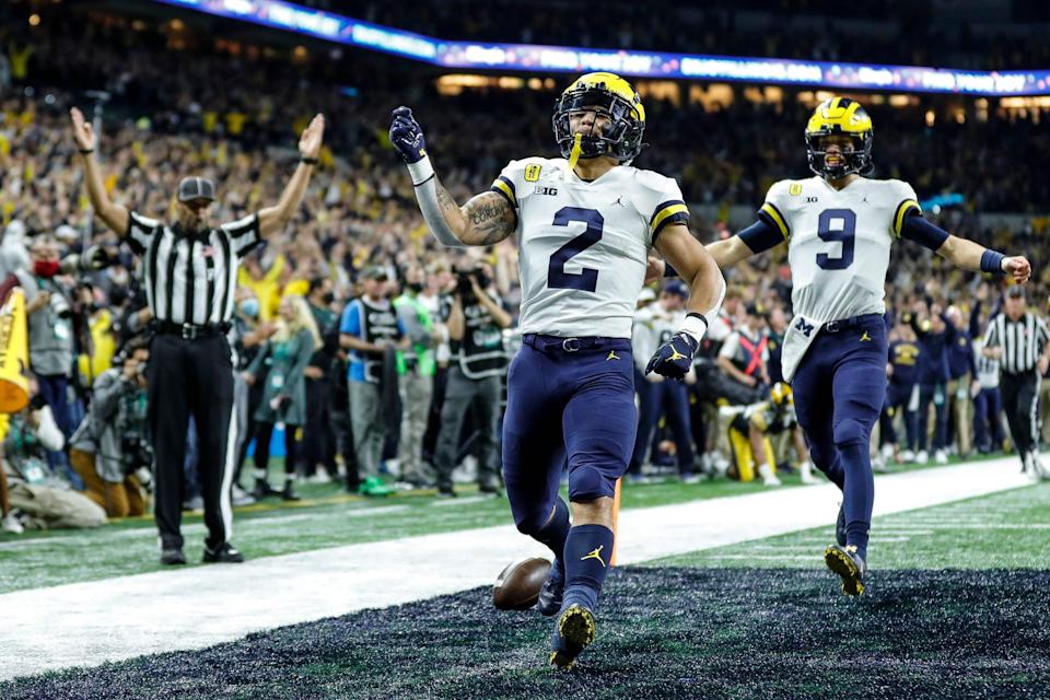 Michigan running back Blake Corum runs for a touchdown against Iowa during the first half of the Big Ten championship game at Lucas Oil Stadium in Indianapolis on Saturday, Dec. 4, 2021.