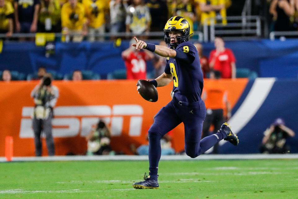 Michigan quarterback J.J. McCarthy looks to pass against Georgia during the second half of the Orange Bowl on Dec. 31, 2021.