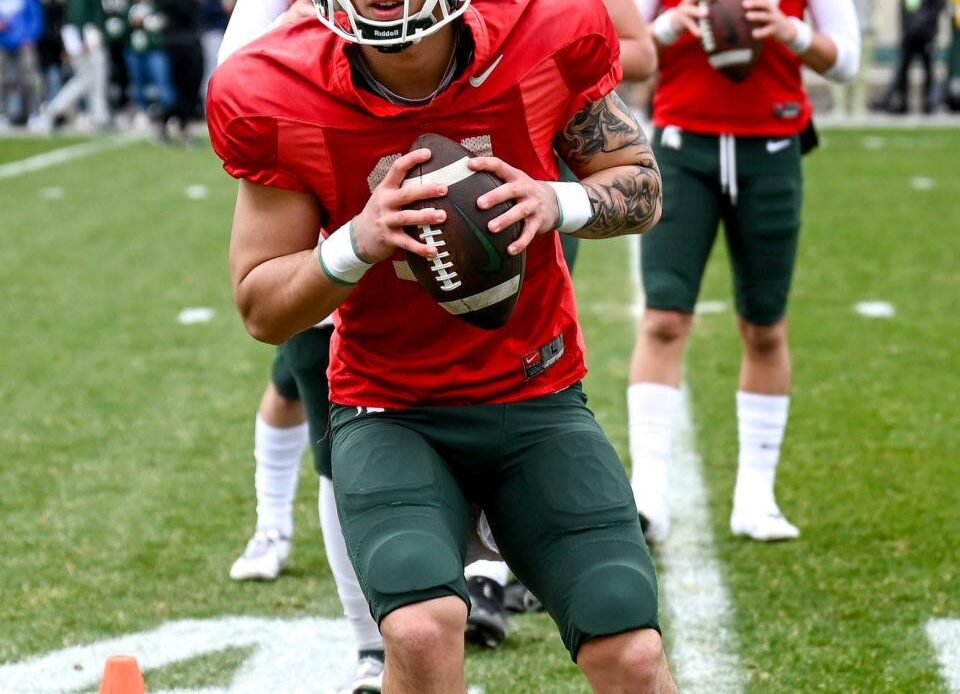 Michigan State's Noah Kim runs a drill with the quarterbacks during the spring game on Saturday, April 16, 2022, at Spartan Stadium in East Lansing.