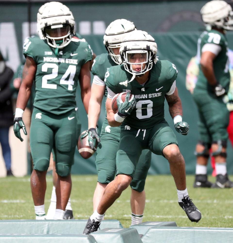 Michigan State running back Jalen Berger goes through drills during the spring practice on Saturday, April 16, 2022, at Spartan Stadium.