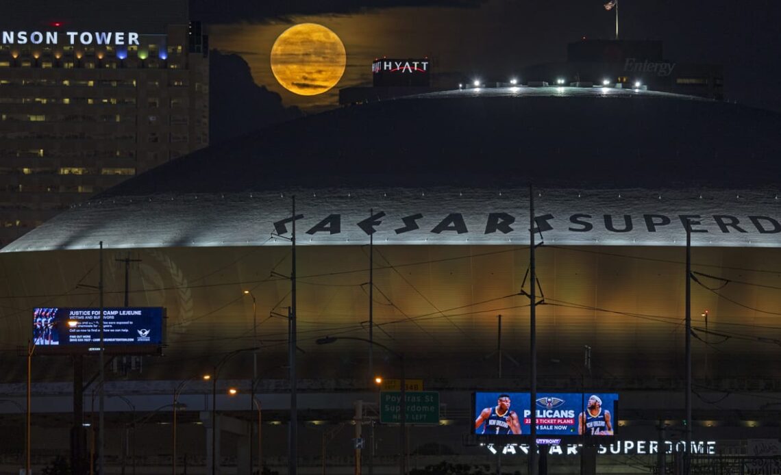 Photos: Supermoon passes over the Caesars Superdome