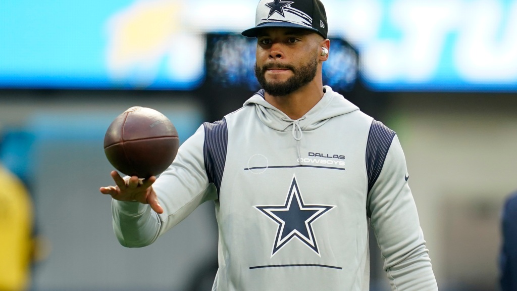 Dak Prescott has left the field with an apparent injury to his throwing hand.