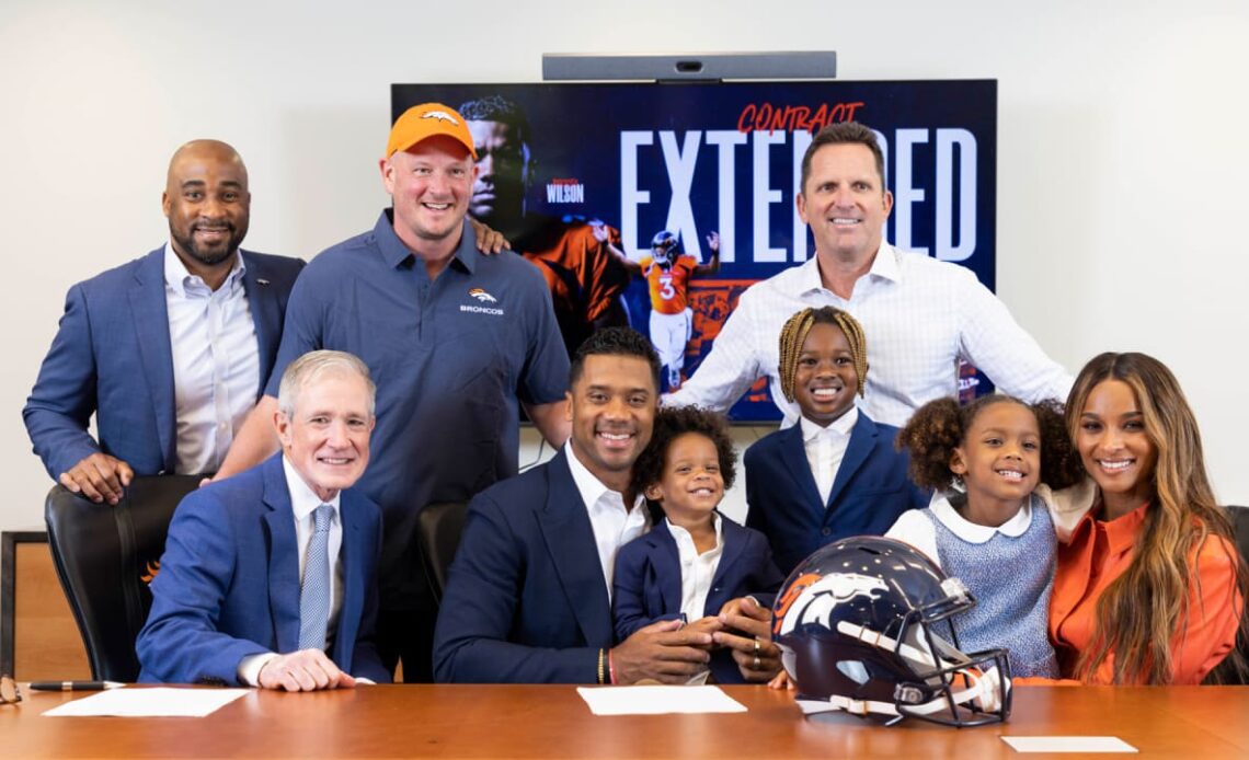Russell Wilson, joined by family, signs contract extension with Broncos