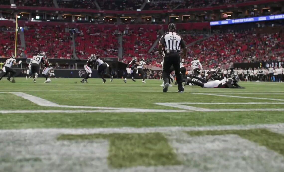 Sideline Access: Quinton Bell dives in to the block the punt leading to a Falcons touchdown