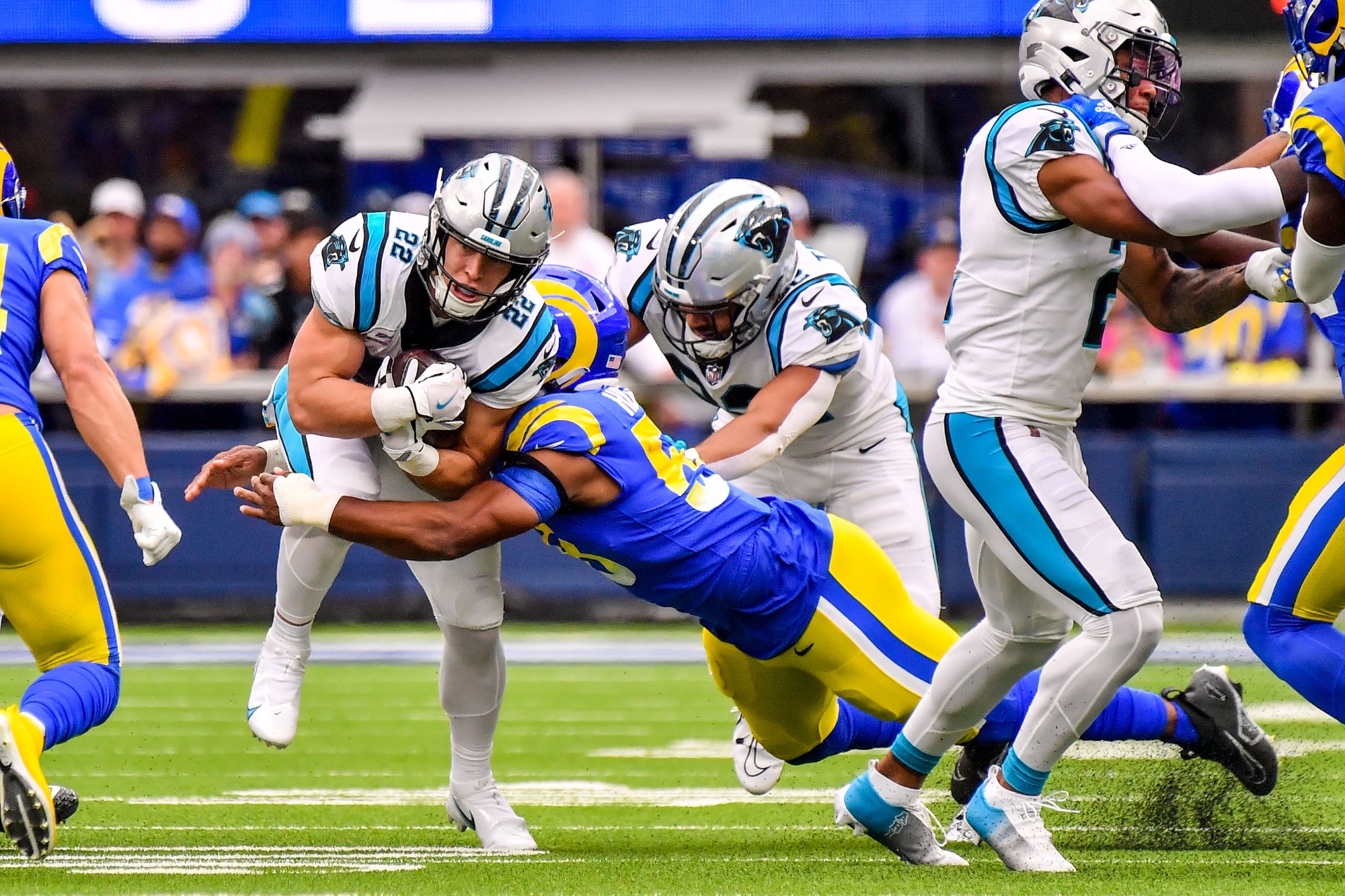 October 16, 2022 Inglewood, CA.Carolina Panthers running back Christian McCaffrey #22 runs for the first down in action in the first quarter during the NFL football game against the Carolina Panthers at SOFI Stadium in Inglewood, California..Mandatory Photo Credit: Louis Lopez/Cal Sport Media(Credit Image: © Louis Lopez/Cal Sport Media)