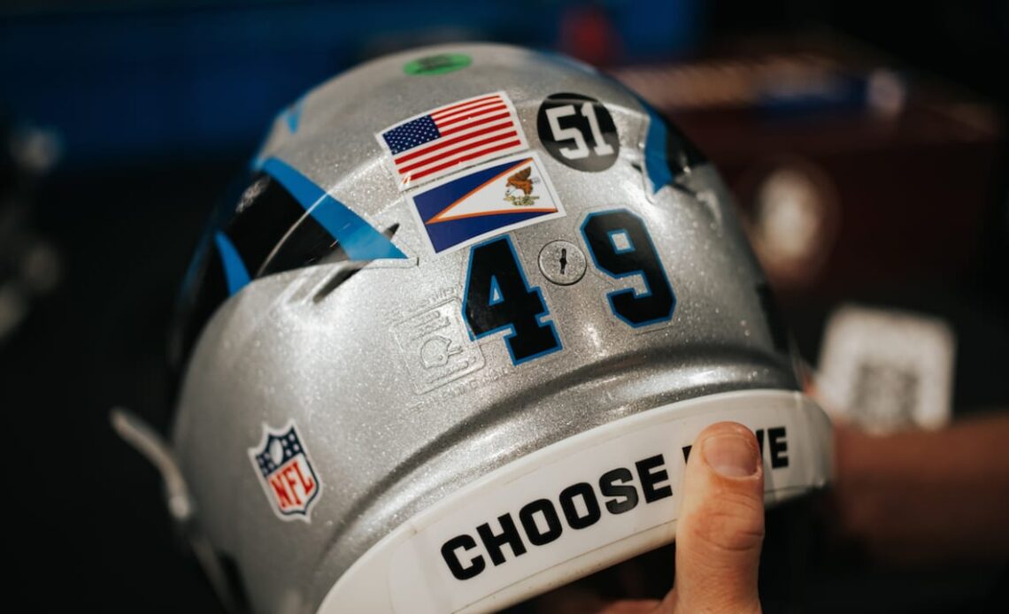 PHOTOS: Panthers participate in NFL International Flag Decal Initiative 
