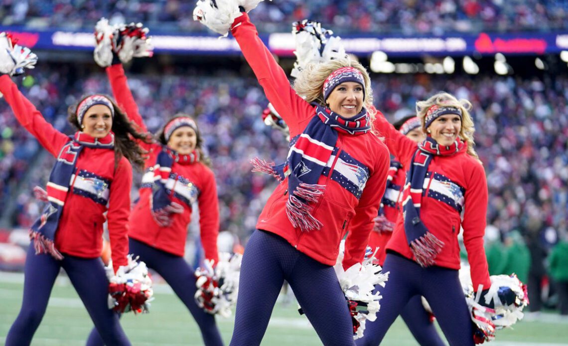 Cheerleaders Perform During Patriots - Jets Game