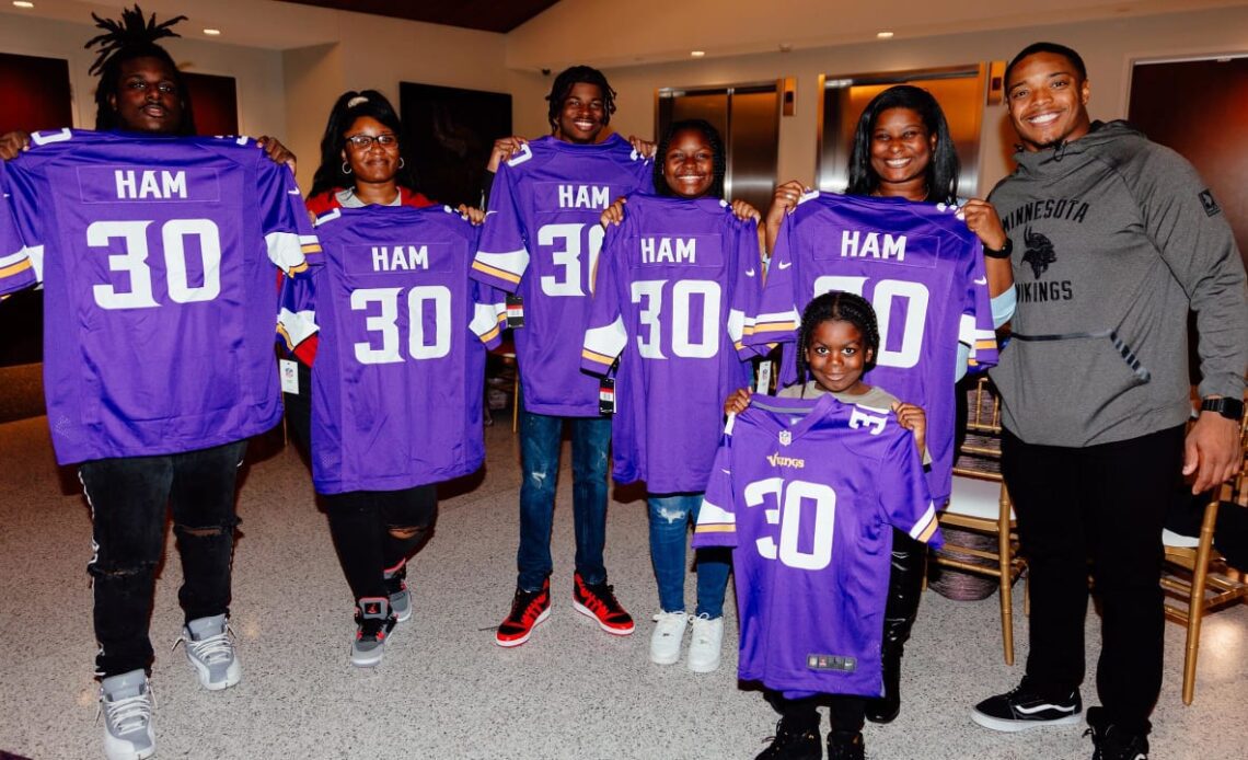 Photos: C.J. Ham 'adopts' Boys & Girls Clubs Family for Holidays