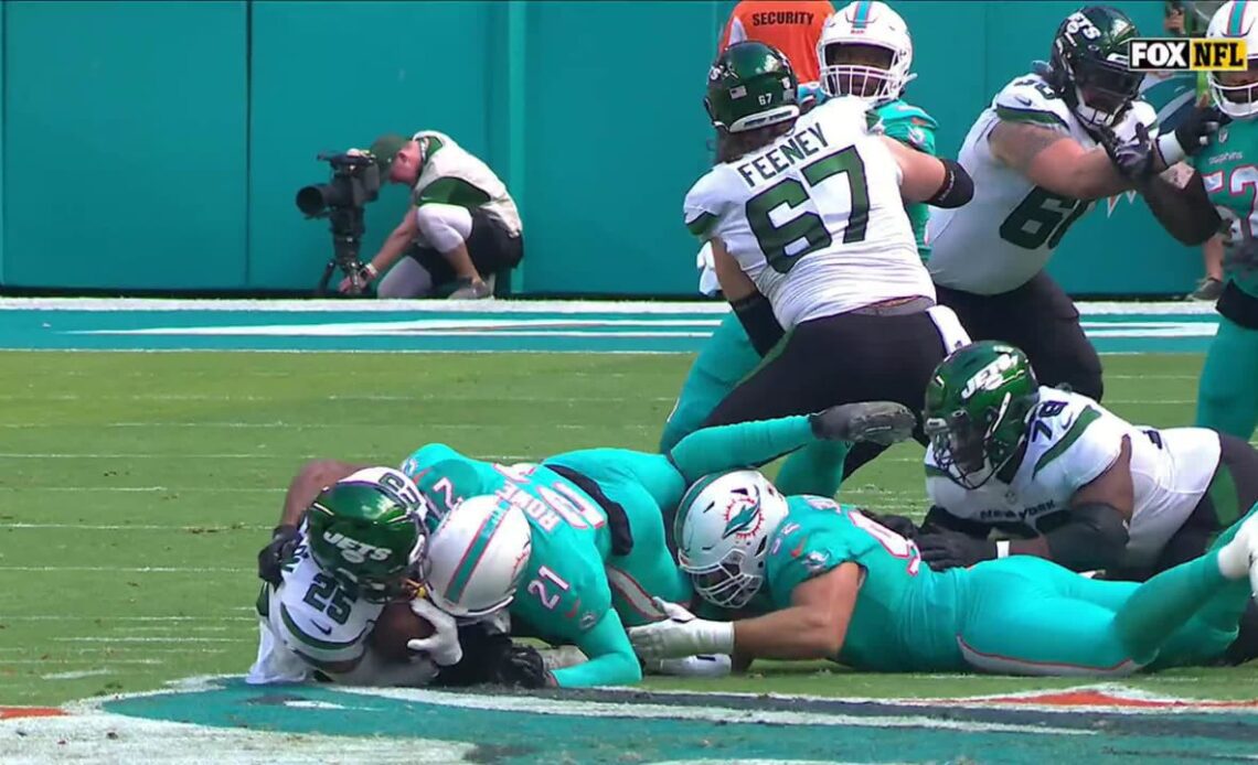 Eric Rowe and Zach Sieler make a Tackle