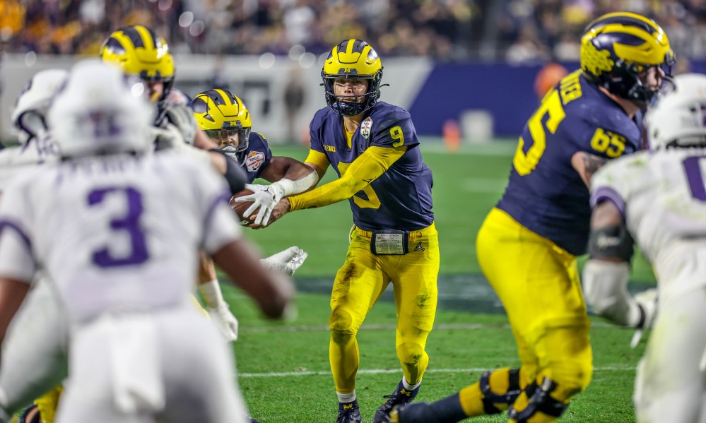 Michigan football head coach tied to the Denver Broncos