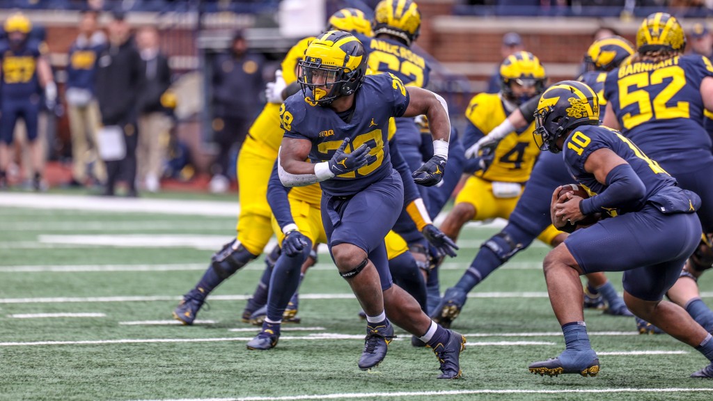 Michigan football coach compares Ben Hall to a former Wolverine great