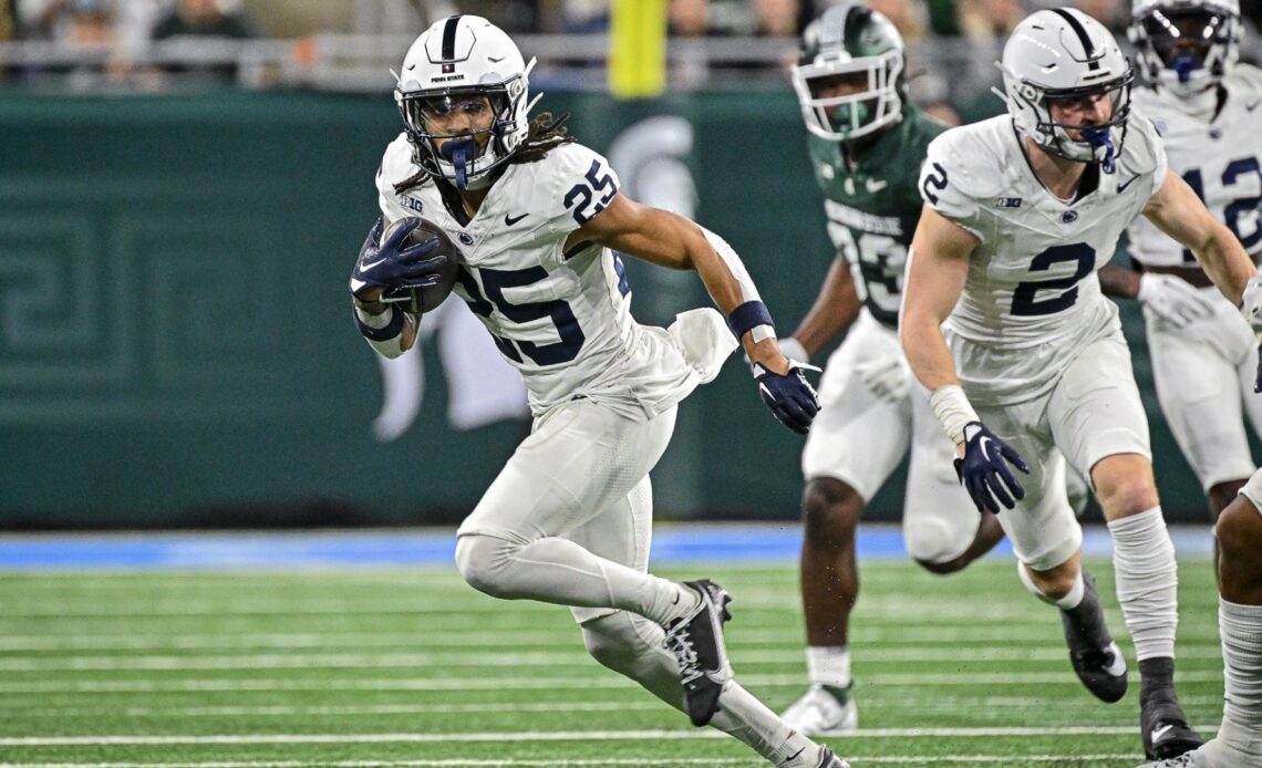 Penn State's Daequan Hardy (25) returns a punt 38 yards during fourth quarter action of the Nittany Lions game with Michigan State.  No. 11 Penn State dominated Michigan State in the Land Grant Trophy game earning a 42-0 shutout victory on Black Friday Nov. 25, 2023.Photo by Mark Selders