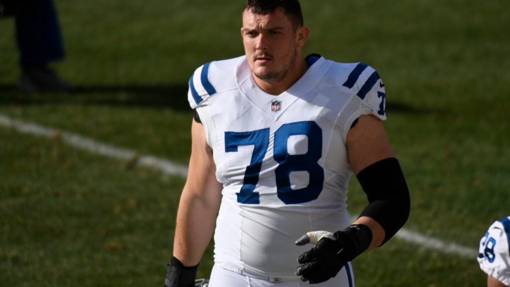 Indianapolis Colts’ Ryan Kelly wearing walking boot at practice