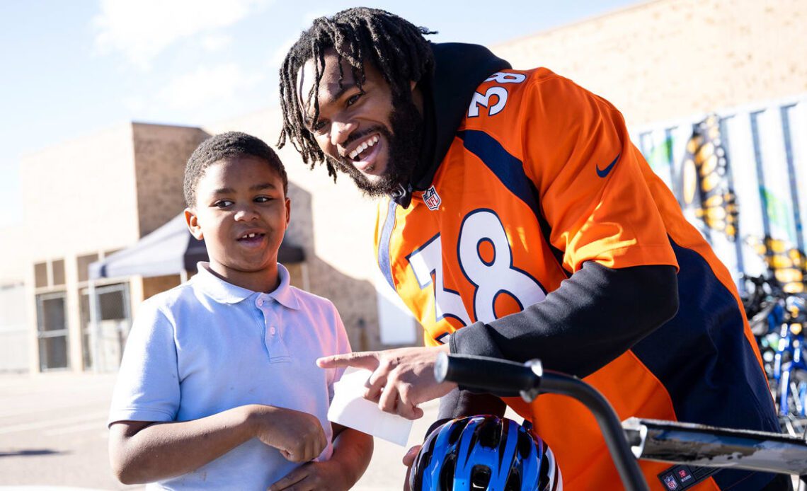 Broncos build bikes, give away to local school students during Random Acts of Kindness Week