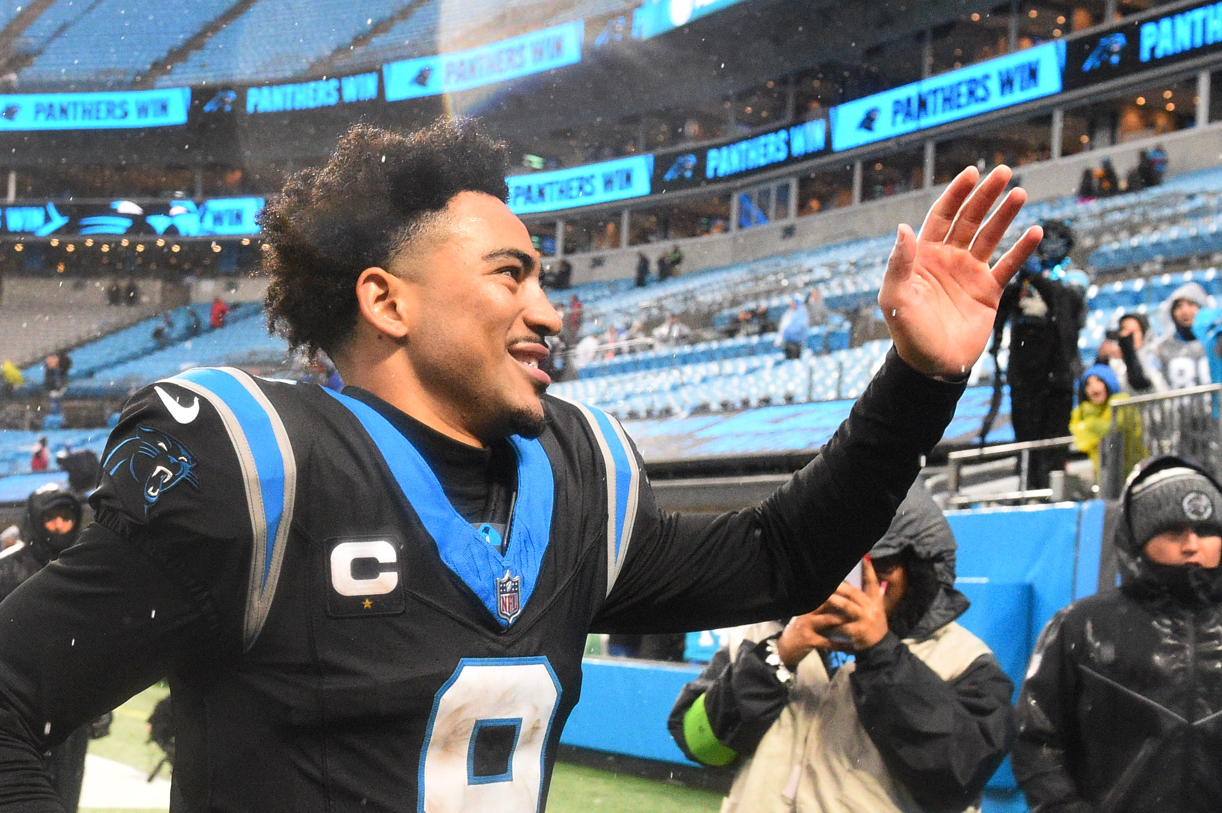 Dec 17, 2023; Charlotte, North Carolina, USA; Carolina Panthers quarterback Bryce Young (9) acknowledges the crowd as he runs off the filed at Bank of America Stadium. Mandatory Credit: Bob Donnan-USA TODAY Sports