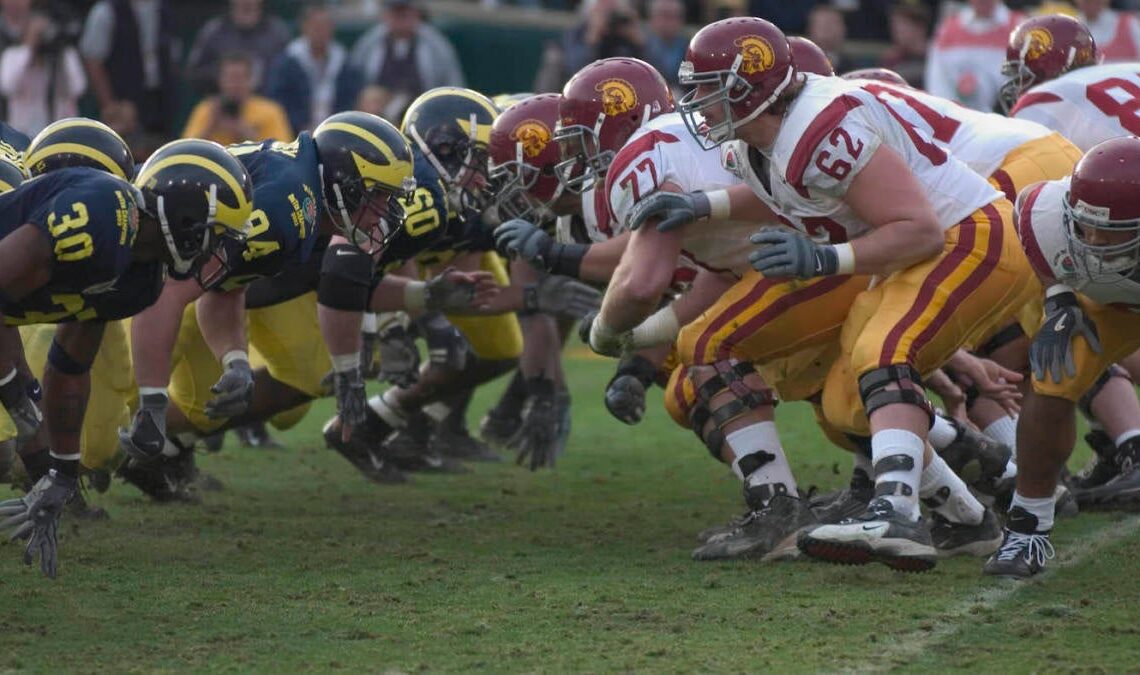 1 Jan 2004: The line of scrimmage during the USC Trojans 28-14 victory over the Michigan Wolverines in the Rose Bowl in Pasadena, CA.