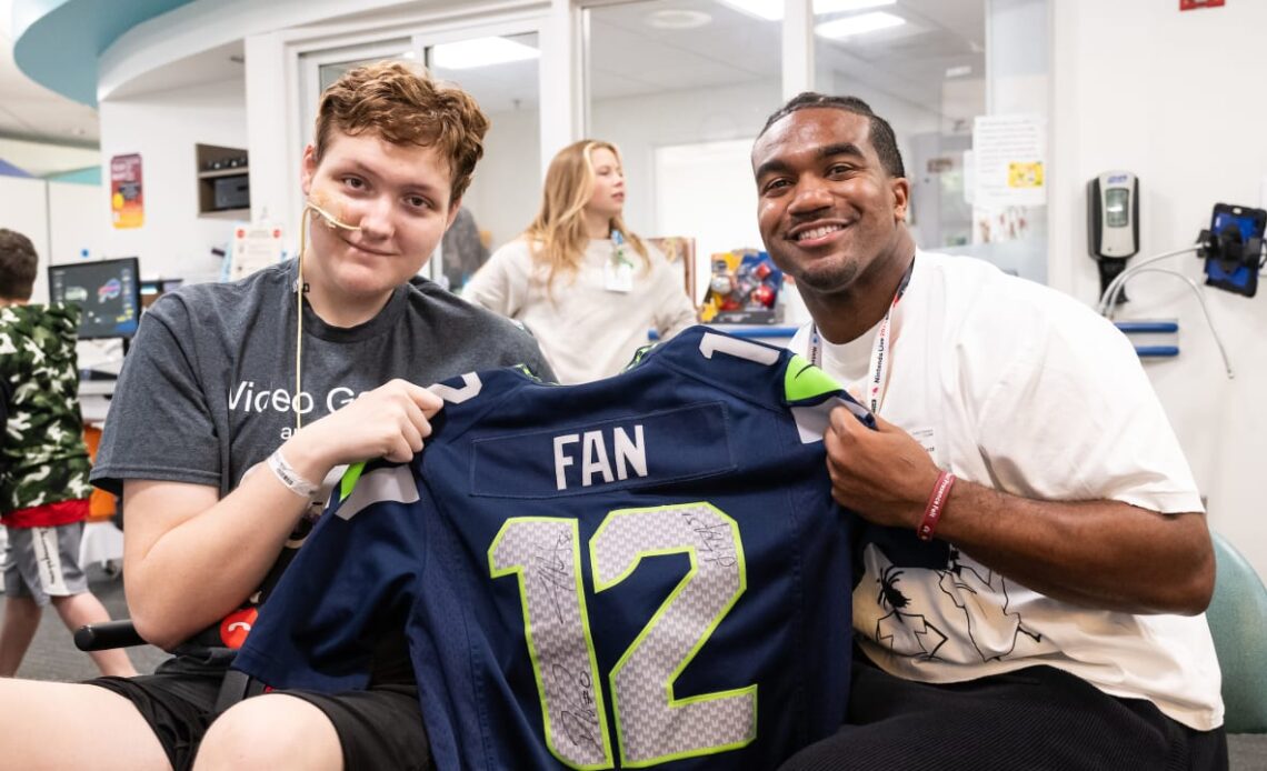 PHOTOS: Seahawks Linebacker Tyrel Dodson Visits Seattle Children's Hospital 